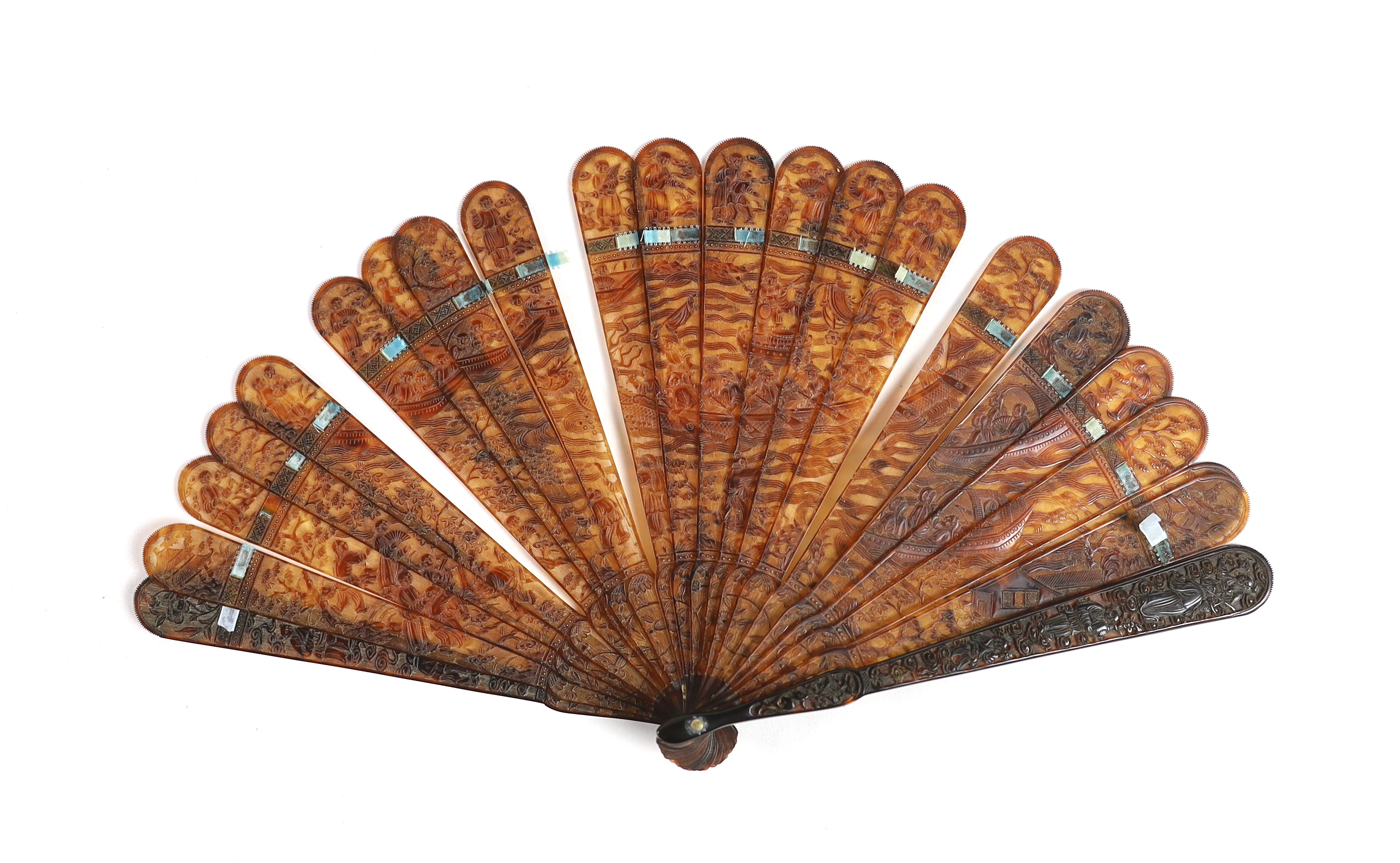 A 19th century Chinese finely carved tortoiseshell brisé fan, 18cm high